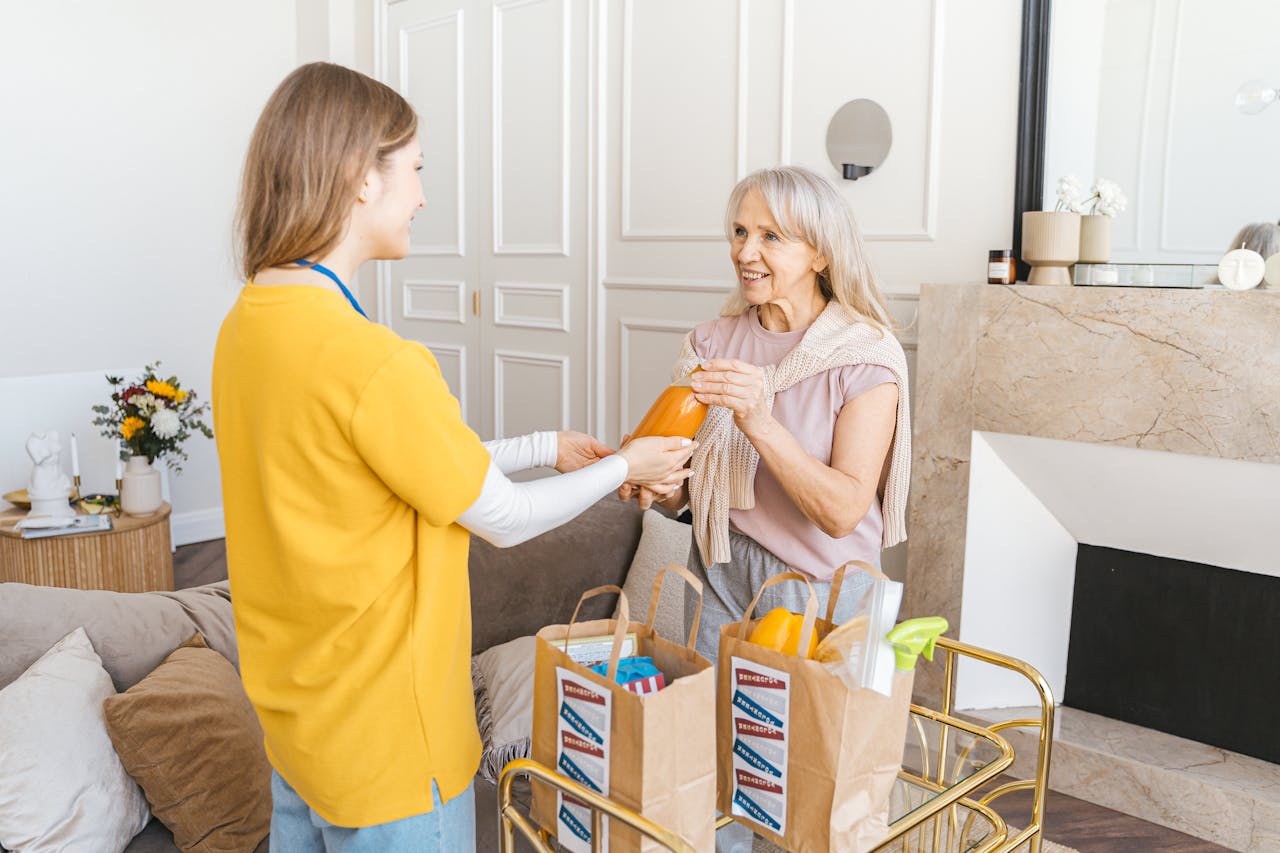 A support worker assisting someone safely at home